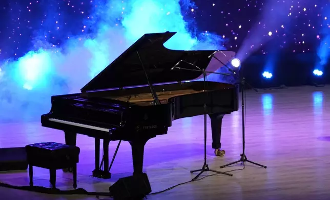 The performance piano stands on stage after the final performance of Takosangba Jamir, 27, a blind pianist, at the two-day Brillante Piano Festival in Bengaluru, India, Sunday, Sept. 29, 2024. (AP Photo/Aijaz Rahi)