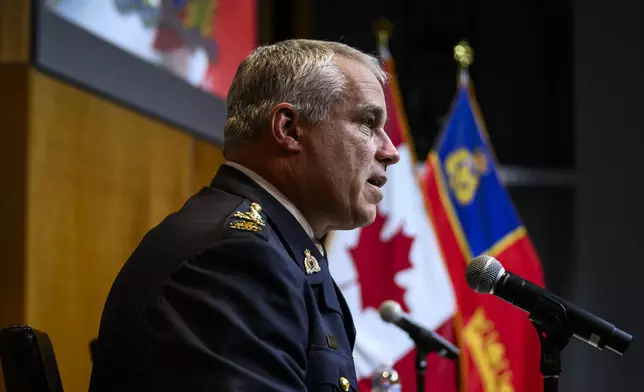 RCMP Commissioner Mike Duheme participates in a news conference at RCMP National Headquarters in Ottawa, Ontaio, Monday, Oct. 14, 2024. (Justin Tang/The Canadian Press via AP)