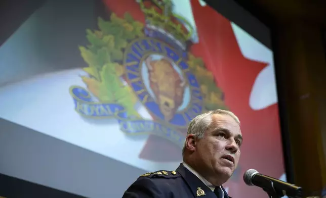 RCMP Commissioner Mike Duheme speaks during a news conference at RCMP National Headquarters in Ottawa, Ontaio, Monday, Oct. 14, 2024. (Justin Tang/The Canadian Press via AP)