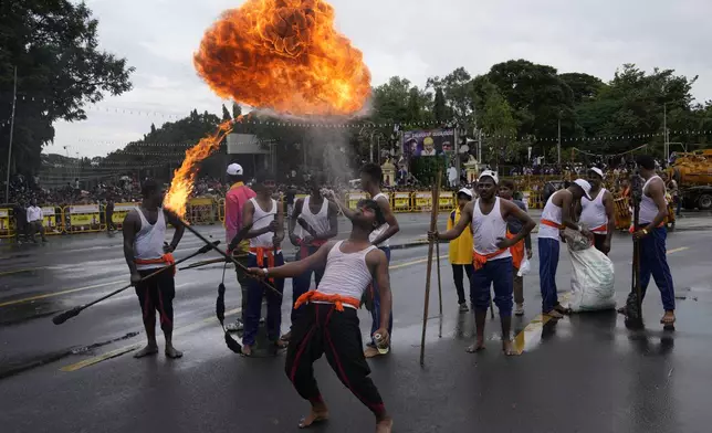 Indian artists perform during a procession on the last day of the Dussehra festivities, in Mysuru, India, Saturday, Oct. 12, 2024. (AP Photo/Aijaz Rahi)