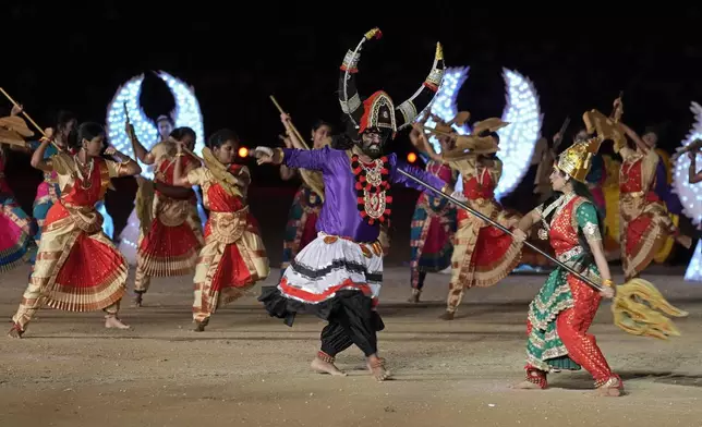 Artists perform during a cultural show part of the Dussehra festivities, in Mysuru, India, Friday, Oct. 11, 2024. (AP Photo/Aijaz Rahi)