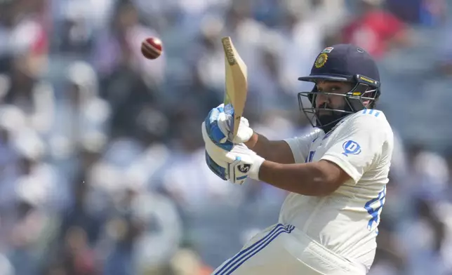 India's captain Rohit Sharma plays a shot during the day three of the second cricket test match between India and New Zealand at the Maharashtra Cricket Association Stadium , in Pune, India, Saturday, Oct. 26, 2024. (AP Photo/Rafiq Maqbool)