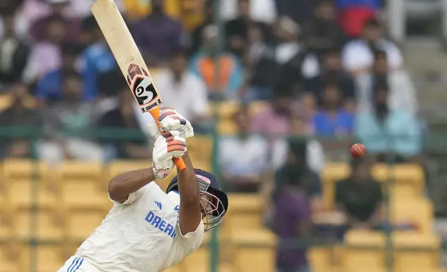 India's Rishabh Pant plays a shot during the day four of the first cricket test match between India and New Zealand at the M.Chinnaswamy Stadium, in Bengaluru, India, Saturday, Oct. 19, 2024. (AP Photo/Aijaz Rahi)