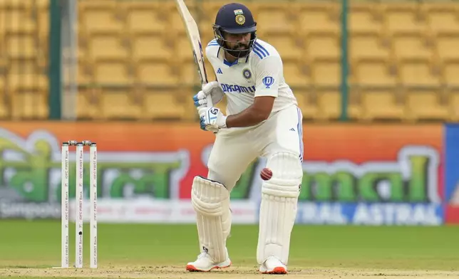 India's captain Rohit Sharma bats during the day two of the first cricket test match between India and New Zealand at the M.Chinnaswamy Stadium, in Bengaluru, India, Thursday, Oct. 17, 2024. (AP Photo/Aijaz Rahi)