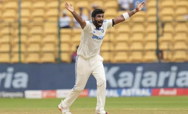 India's Jasprit Bumrah appeals for the wicket of New Zealand's Devon Conway before asking for a successful review during the day five of the first cricket test match between India and New Zealand at the M.Chinnaswamy Stadium, in Bengaluru, India, Sunday, Oct. 20, 2024. (AP Photo/Aijaz Rahi)