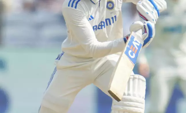 India's Shubman Gill plays a shot during the day three of the second cricket test match between India and New Zealand at the Maharashtra Cricket Association Stadium , in Pune, India, Saturday, Oct. 26, 2024. (AP Photo/Rafiq Maqbool)