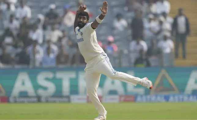 India's Jasprit Bumrah fields the ball during the day one of the second cricket test match between India and New Zealand at the Maharashtra Cricket Association Stadium , in Pune, India, Thursday, Oct. 24, 2024. (AP Photo/Rafiq Maqbool)