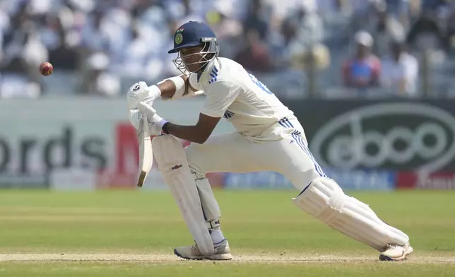 India's Yashasvi Jaiswal plays a shot during the day three of the second cricket test match between India and New Zealand at the Maharashtra Cricket Association Stadium , in Pune, India, Saturday, Oct. 26, 2024. (AP Photo/Rafiq Maqbool)