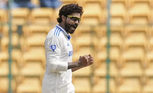 India's Ravindra Jadeja celebrates the dismissal of New Zealand's Matt Henry during the day three of the first cricket test match between India and New Zealand at the M.Chinnaswamy Stadium, in Bengaluru, India, Friday, Oct. 18, 2024. (AP Photo/Aijaz Rahi)