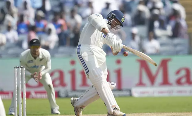 India's Yashasvi Jaiswal plays a shot during the day three of the second cricket test match between India and New Zealand at the Maharashtra Cricket Association Stadium , in Pune, India, Saturday, Oct. 26, 2024. (AP Photo/Rafiq Maqbool)