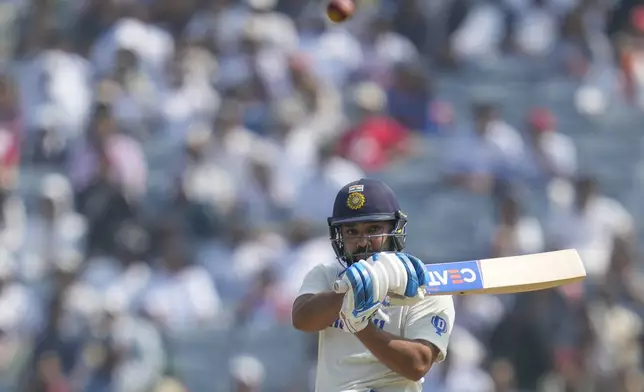 India's captain Rohit Sharma plays a shot during the day three of the second cricket test match between India and New Zealand at the Maharashtra Cricket Association Stadium , in Pune, India, Saturday, Oct. 26, 2024. (AP Photo/Rafiq Maqbool)