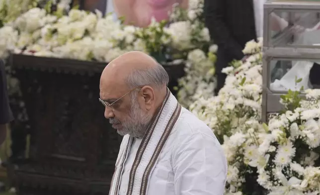 Indian Home Minister Amit Shah pays tributes to Indian business leader Ratan Tata who died on Wednesday night, in Mumbai, India, Thursday, Oct. 10, 2024. (AP Photo /Rafiq Maqbool)