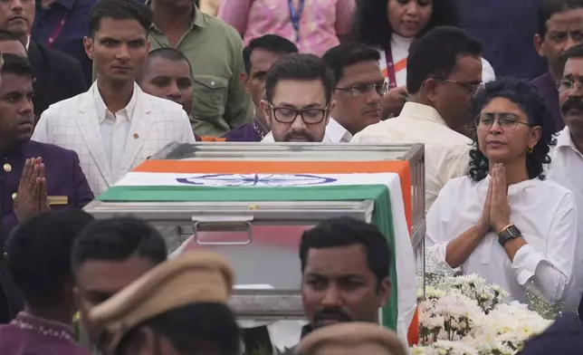 Bollywood actor Aamir Khan pays tributes to Indian business leader Ratan Tata who died on Wednesday night, in Mumbai, India, Thursday, Oct. 10, 2024. (AP Photo /Rafiq Maqbool)