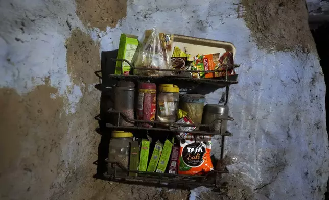 Tata salt is kept in a wall shelf among other spices in a kitchen in Prayagraj, India, Thursday, Oct. 10, 2024. (AP Photo/Rajesh Kumar Singh)