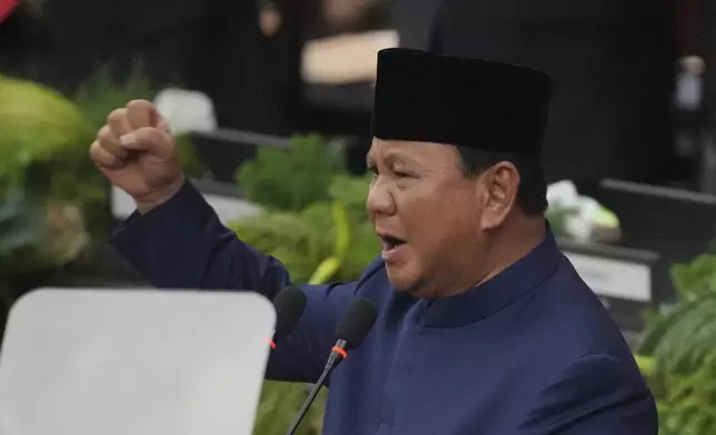 Indonesia's newly-inaugurated Indonesian President Prabowo Subianto delivers a speech during the presidential inauguration ceremony at the Parliament building in Jakarta, Indonesia, Sunday, Oct. 20, 2024. (AP Photo/Tatan Syuflana)