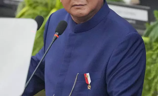 Indonesia's newly-inaugurated President Prabowo Subianto delivers a speech during the presidential inauguration ceremony at the Parliament building in Jakarta, Indonesia, Sunday, Oct. 20, 2024. (AP Photo/Tatan Syuflana)