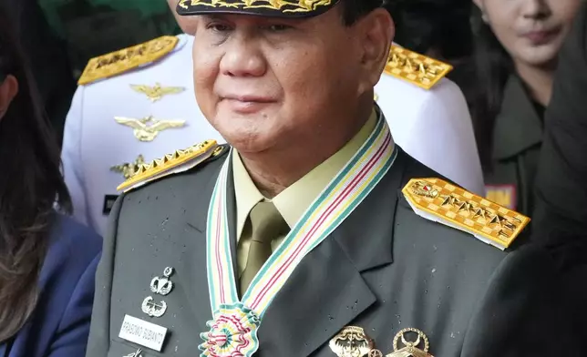 FILE - Indonesian Defense Minister Prabowo Subianto pauses after being awarded honorary rank of four-star general by President Joko Widodo during a ceremony at the Armed Forces Headquarters in Jakarta, Indonesia, Wednesday, Feb. 28, 2024. (AP Photo/Achmad Ibrahim, File)