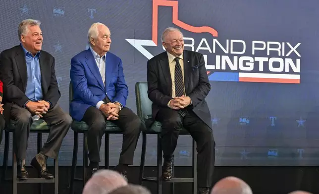 Texas Rangers chief operating officer Neil Leibman, left, IndyCar owner Roger Penske, center, and Dallas Cowboys team owner Jerry Jones look on during a news conference announcing the IndyCar Grand Prix of Arlington to be held in 2026 in Arlington, Texas, Tuesday, Oct. 8, 2024. (AP Photo/Jerome Miron)