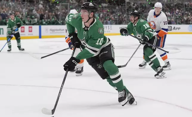 Dallas Stars center Oskar Bäck (10) skates with the puck during the first period of an NHL hockey game against the New York Islanders Saturday, Oct. 12, 2024, in Dallas. (AP Photo/LM Otero)