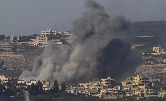 Smoke rises following an Israeli bombardment in southern Lebanon as seen from northern Israel, Thursday, Oct. 3, 2024. (AP Photo/Baz Ratner)