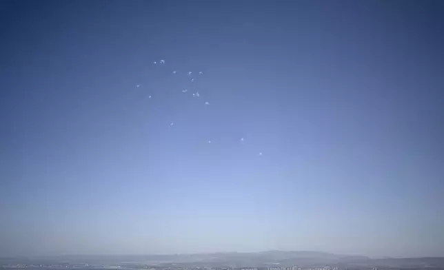 Projectiles fired from Lebanon are intercepted over Haifa, Israel, Wednesday, Oct. 23, 2024. (AP Photo/Maya Alleruzzo)