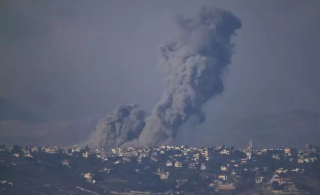 Smoke rises following Israeli bombardment in southern Lebanon as seen from northern Israel, Thursday, Oct. 17, 2024. (AP Photo/Leo Correa)