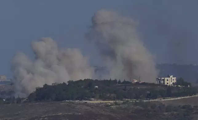 Smoke rises following Israeli bombardment in southern Lebanon as seen from northern Israel, Thursday, Oct. 3, 2024. (AP Photo/Baz Ratner)