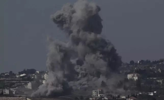 Smoke rises following Israeli bombardment in southern Lebanon as seen from northern Israel, Saturday, Oct. 5, 2024. (AP Photo/Leo Correa)