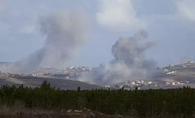 Smoke rises following Israeli bombardment in southern Lebanon as seen from northern Israel, Wednesday, Oct. 2, 2024. (AP Photo/Baz Ratner)