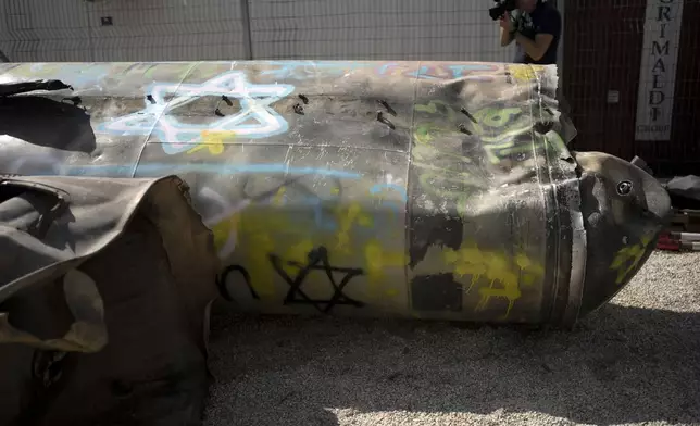 Iranian ballistic missile components that were fired at Israel are displayed during a government-organized media tour on a base in southern Israel, Wednesday, Oct. 9, 2024. (AP Photo/Maya Alleruzzo)