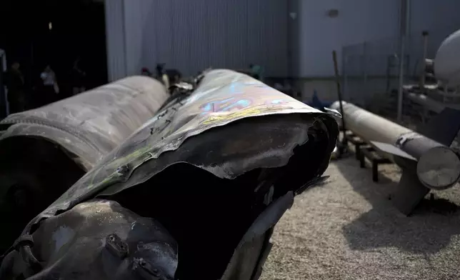 Iranian ballistic missile components that were fired at Israel are displayed during a government-organized media tour on a base in southern Israel, Wednesday, Oct. 9, 2024. (AP Photo/Maya Alleruzzo)