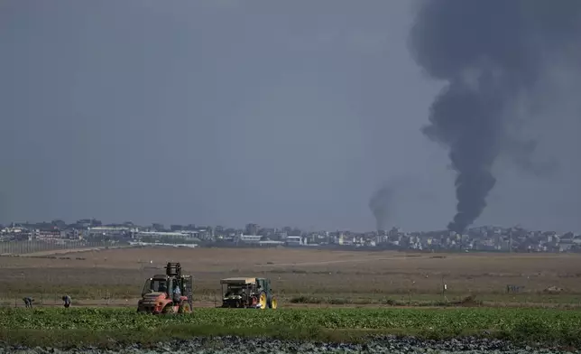 Smoke from Israeli bombardment rises from the Gaza Strip, as seen from southern Israel, Wednesday, Oct. 16, 2024. (AP Photo/Tsafrir Abayov)