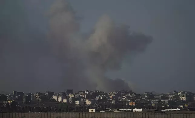 Smoke rises following Israeli bombardment on the Gaza Strip, as seen from southern Israel, Sunday, Oct. 20, 2024. (AP Photo/Tsafrir Abayov)