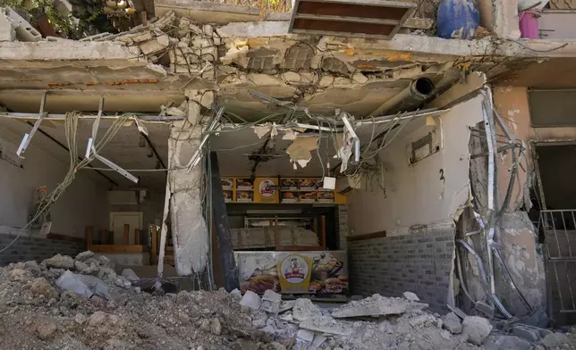 A destroyed restaurant in the West Bank refugee camp of Nur Shams, during the Israeli army operation in Tulkarem Thursday, Sept. 12, 2024. (AP Photo/Nasser Nasser)