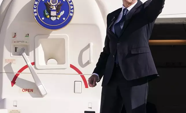 U.S. Secretary of State Antony Blinken waves as he departs for Riyadh, Saudi Arabia, from Ben Gurion International Airport in Tel Aviv, Israel, Wednesday, Oct. 23, 2024. (Nathan Howard/Pool Photo via AP)