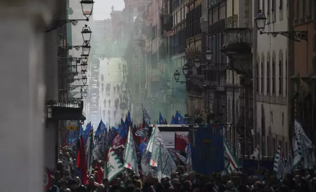 Workers of automotive sector march during a demonstration in Rome on the occasion of their national strike, Friday, Oct. 18, 2024. (AP Photo/Gregorio Borgia)