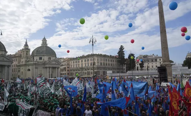 Workers of automotive sector gather in Rome's Piazza del Popolo Square during a demonstration on the occasion of their national strike, Friday, Oct. 18, 2024. (AP Photo/Gregorio Borgia)