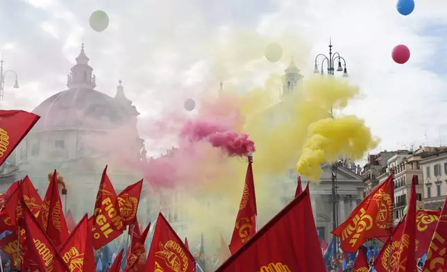 Workers of automotive sector march during a demonstration in Rome on the occasion of their national strike, Friday, Oct. 18, 2024. (AP Photo/Gregorio Borgia)