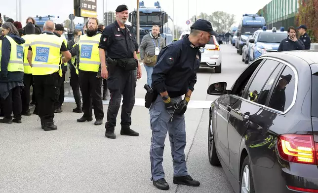 Police patrol ahead of the Nations League soccer match between Italy and Israel, at the Bluenergy stadium in Udine, Italy, Monday, Oct. 14, 2024. (Andrea Bressanutti/LaPresse via AP)