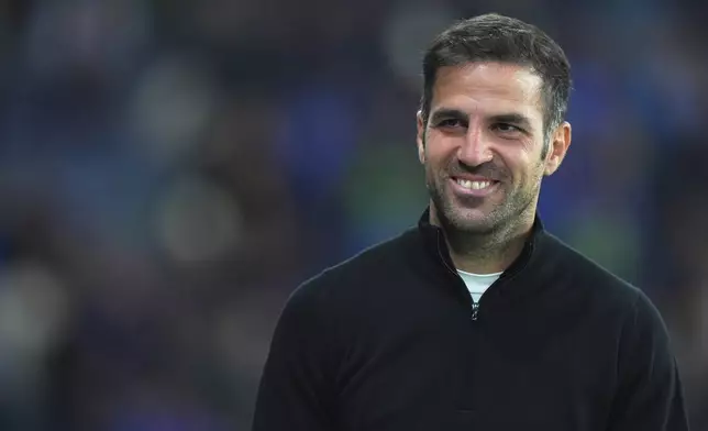 Como's Cesc Fabregas smiles following the Serie A soccer match between Atalanta and Como at the Gewiss Stadium in Bergamo, Italy, Tuesday, Sept. 24 , 2024. (Spada/LaPresse via AP)