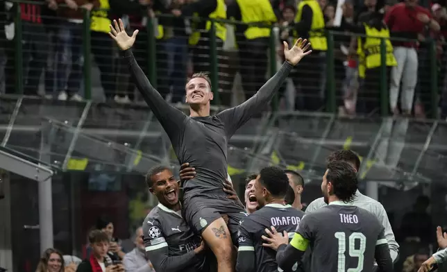 AC Milan's Francesco Camarda celebrates after scoring a goal that was later disallowed, during the Champions League opening phase soccer match between AC Milan and Club Brugge at the San Siro stadium in Milan, Italy, Tuesday, Oct. 22, 2024. (AP Photo/Antonio Calanni)