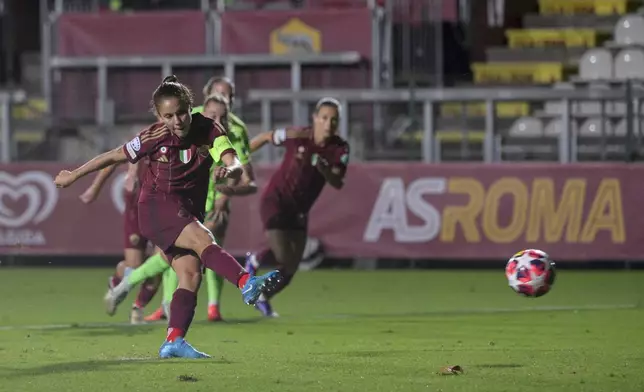 AS Roma's Manuela Giugliano kicks the 1-0 goal against Wolfsburg during a women's Champions League Group A game between AS Roma and Wolfsburg at the Tre Fontane stadium in Rome, Tuesday, Oct. 8, 2024. (Fabrizio Corradetti/LaPresse via AP)