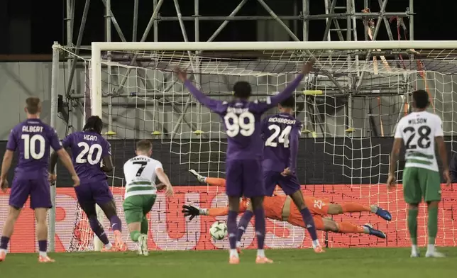 Fiorentina's Moise Kean, second from left, scores his side's goal during the Conference League soccer match between Fiorentina and The New Saints at Artemio Franchi Stadium in Florence, Italy, Thurday, Oct. 3, 2024. (Massimo Paolone/LaPresse via AP)