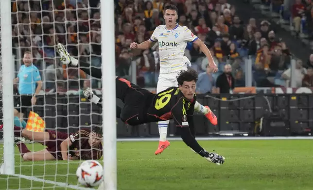 Dynamo Kyiv's Oleksandr Tymchyk makes an attempt to score during the Europa League opening phase soccer match between Roma and Dinamo Kyiv at the Olympic Stadium, in Rome, Thursday, Oct. 24, 2024. (AP Photo/Gregorio Borgia)