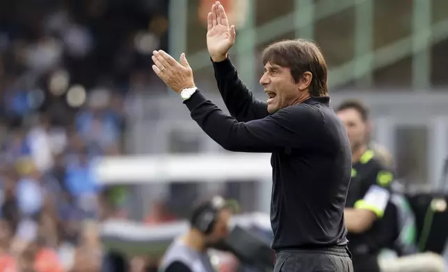 Napoli's head coach Antonio Conte gestures during the Serie A soccer match between Napoli and Lecce at the Diego Armando Maradona Stadium in Naples, Italy, Saturday, Oct. 26, 2024. (Alessandro Garofalo/LaPresse via AP)