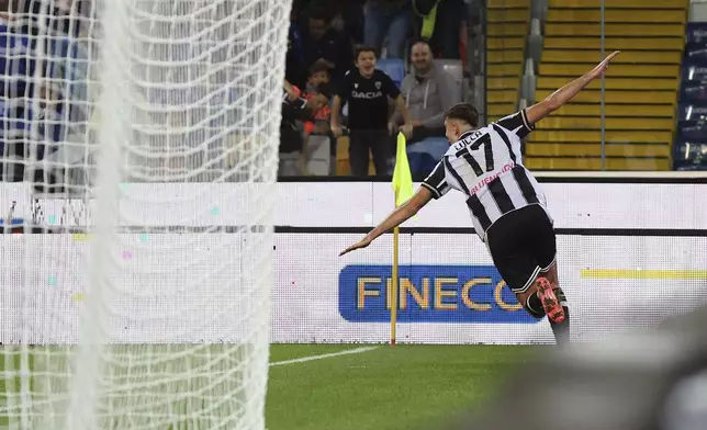 Udinese's Lorenzo Lucca celebrates after scoring their side's first goal of the game during the Serie A soccer match between Udinese and Cagliari at the Bluenergy Stadium in Udine, Italy, Friday, Oct. 25, 2024. (Andrea Bressanutti/LaPresse via AP)