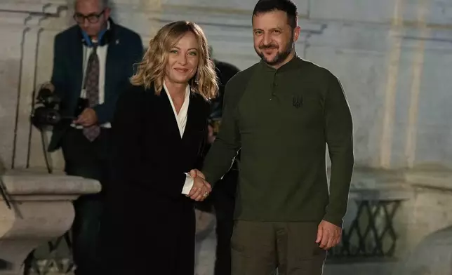 Italian Premier Giorgia Meloni, left, and Ukrainian President Volodymyr Zelenskyy meet at Villa Pamphilj, in Rome, Thursday, Oct. 10, 2024. (AP Photo/Andrew Medichini)