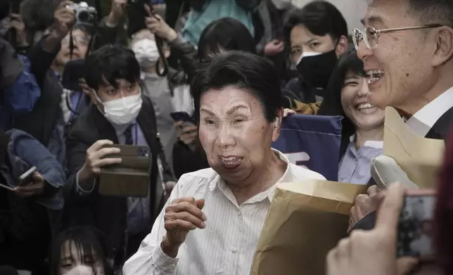 Hideko Hakamada, sister of former boxer Iwao Hakamada who has been on death row for the 1966 murder case, weeps after Tokyo High Court ordered a retrial for her brother, in front of the court in Tokyo, on March 13, 2023. Japanese prosecutors said on Oct. 8, 2024 they will not appeal the Sept. 26 ruling of the Shizuoka District Court that acquitted the world’s longest-serving death-row inmate in a retrial. (Kyodo News via AP)