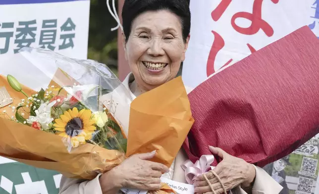 Hideko Hakamada celebrates after the Shizuoka District Court found her brother Iwao Hakamada not guilty following a retrial for a 1966 quadruple murder, in Shizuoka, central Japan, on Sept. 26, 2024. Japanese prosecutors said on Oct. 8, 2024 they will not appeal the Sept. 26 ruling of the Shizuoka District Court that acquitted the world’s longest-serving death-row inmate in a retrial. (Kyodo News via AP)