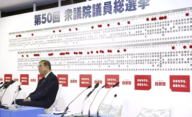 Japan's Prime Minister and president of the Liberal Democratic Party (LDP) Shigeru Ishiba speaks to the media regarding the early result of lower house election, at the LDP headquarters Sunday, Oct. 27, 2024, in Tokyo, (Kyodo News via AP)